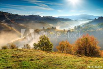 Colorful autumn landscape with misty valley,Holbav,Transylvania,Romania,Europe Naklejkomania - zdjecie 1 - miniatura
