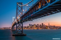 San Francisco skyline framed by the Bay Bridge at sunset Naklejkomania - zdjecie 1 - miniatura