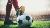 feet of soccer player tread on soccer ball for kick-off in the stadium Naklejkomania - zdjecie 1 - miniatura