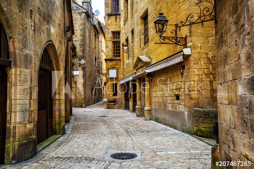 Narrow street in the Old Town of Sarlat, Perigord, France