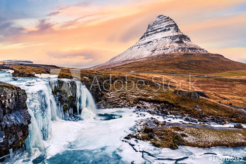 Kirkjufell mount and waterfall. Kirkjufell (Church mountain) is a 463m high mountain on the north coast of Saefellsnes peninsula and a famous icelandic landmark
