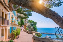 Monaco village in Monaco, Monte Carlo, France. Walking street with beautiful buildings along the coast. Naklejkomania - zdjecie 1 - miniatura