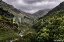 river valley in the Caucasus mountains in cloudy weather Naklejkomania - zdjecie 1 - miniatura