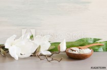 A spa background with silk magnolia flowers and bamboo on slate Naklejkomania - zdjecie 1 - miniatura