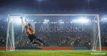 Soccer goalkeeper in action on the stadium Naklejkomania - zdjecie 1 - miniatura