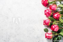 Red rose flower bouquet on stone  table. Naklejkomania - zdjecie 1 - miniatura