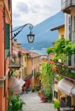 Picturesque small town street view in Lake Como Italy Naklejkomania - zdjecie 1 - miniatura