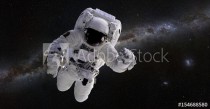 Astronaut in front of the Milky Way galaxy Naklejkomania - zdjecie 1 - miniatura