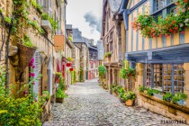 Beautiful alley scene in an old town in Europe Naklejkomania - zdjecie 1 - miniatura