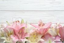 Flat lay composition with beautiful blooming lily flowers on wooden background Naklejkomania - zdjecie 1 - miniatura