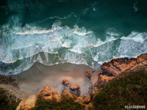 Waves breaking on coastline from overhead Naklejkomania - zdjecie 1 - miniatura