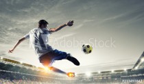 Soccer player at stadium. Mixed media Naklejkomania - zdjecie 1 - miniatura