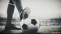 feet of soccer player tread on soccer ball for kick-off in the stadium black and white Naklejkomania - zdjecie 1 - miniatura