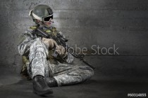 Soldier with rifle and mask resting Naklejkomania - zdjecie 1 - miniatura