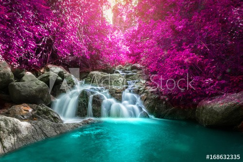 Beautiful colorful waterfall in autumn forest. - zdjęcie 1