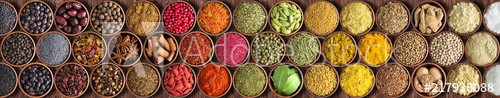 Colorful Indian spices background, top view.  large set of seasoning is lined with a rainbow - zdjęcie 1
