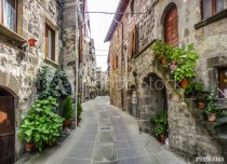 Beautiful view of old traditional houses and idyllic alleyway in the historic town of Vitorchiano, Viterbo, Lazio, Italy Naklejkomania - zdjecie 1 - miniatura