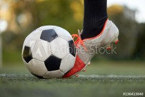 soccer player playing with ball on football field Naklejkomania - zdjecie 1 - miniatura