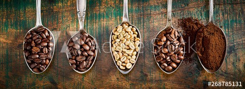 Assortment of different coffee in vintage spoons
