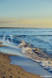 Breakwaters in the Baltic sea over the sunset Naklejkomania - zdjecie 1 - miniatura