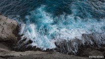 Aerial view to ocean waves and rock coast Naklejkomania - zdjecie 1 - miniatura