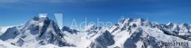 Panoramic view of snow-capped mountain peaks Naklejkomania - zdjecie 1 - miniatura