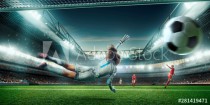 Female Soccer Goalkeeper catch the ball on a professional soccer stadium. Girls playing soccer Naklejkomania - zdjecie 1 - miniatura