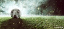 Fußball liegt auf Stadionrasen im Rauch Naklejkomania - zdjecie 1 - miniatura